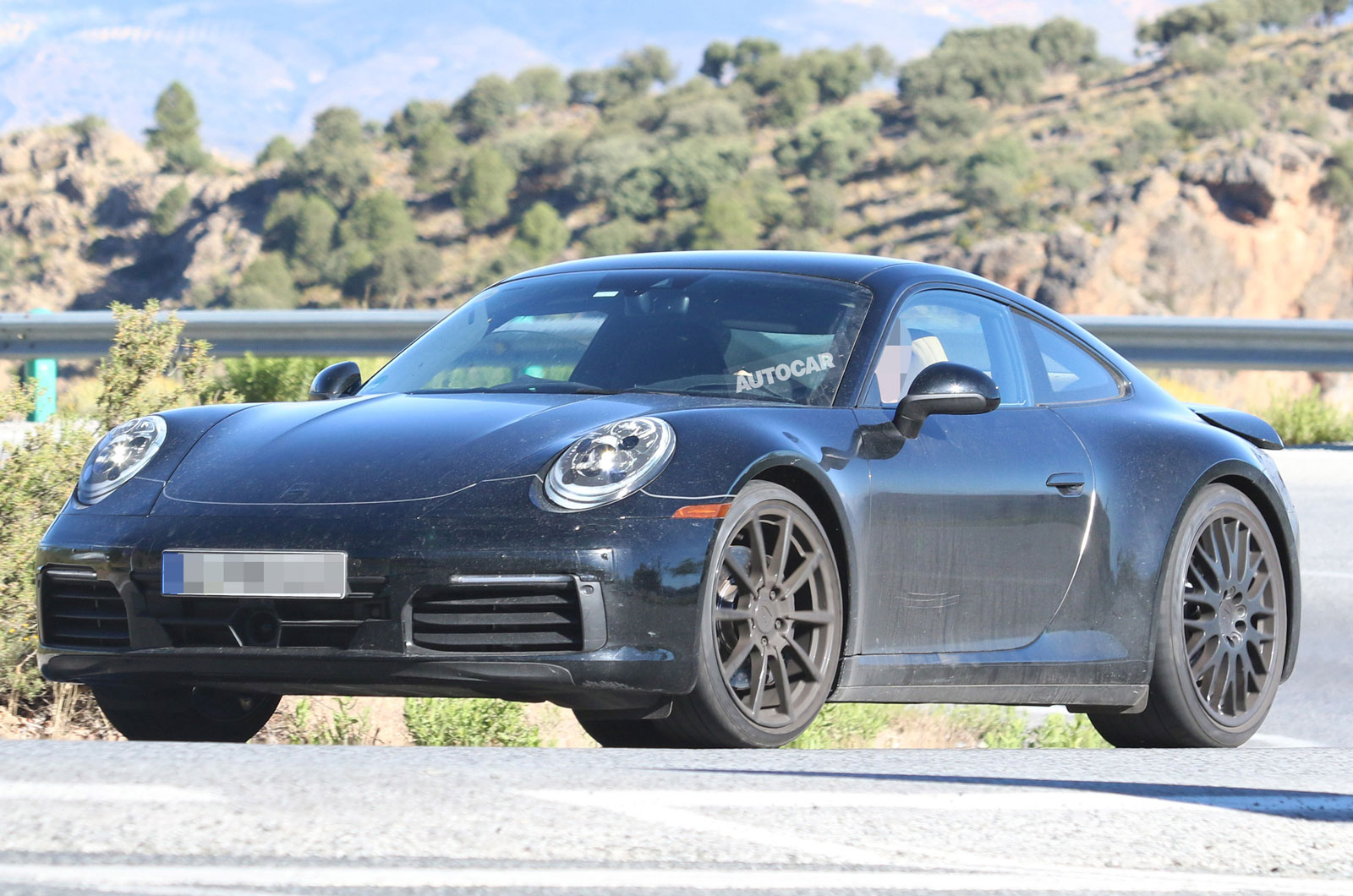 Следующий Porsche 911 получит цифровую черту и гибридную мощность